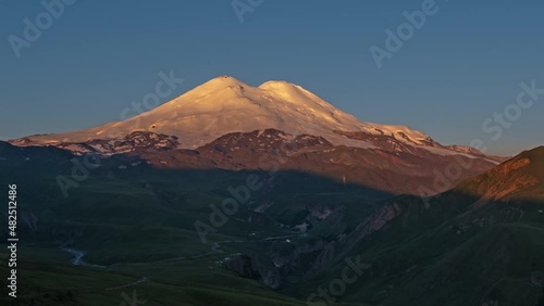 Beautiful view of Mount Elbrus at sunrise, North Caucasus mountains, Russia, timelapse 4k