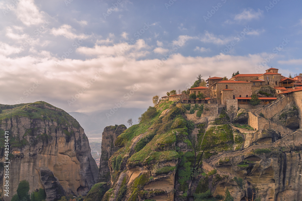View of the great Meteoron monastery with blue sky and clouds, Meteora Greece
