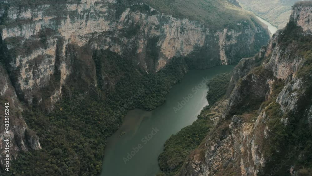 High Mountain Walls With Lush Vegetation At Sumidero Canyon In Chiapas State, Southern Mexico. Aerial Drone High Mountain Walls With Lush Vegetation At Sumidero Canyon In Chiapas State, Southern Mexico. Aerial Drone