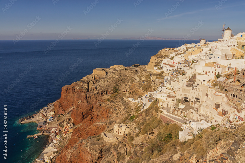 View of Oia with red cliffs and Aegean Sea,  Santorini, Greece
