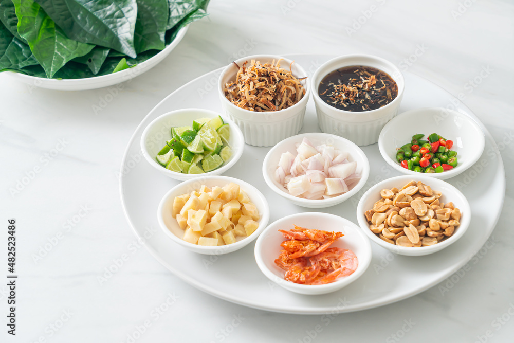 Miang kham - A royal leaf wrap appetizer Miang kham - A royal leaf wrap appetizer