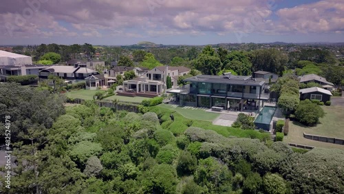 Aerial: Clifftop views from Karaka bay, Auckland, New Zealand photo