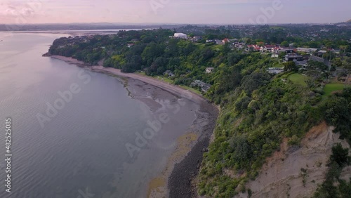 Aerial: Clifftop views from Karaka bay, Auckland, New Zealand photo