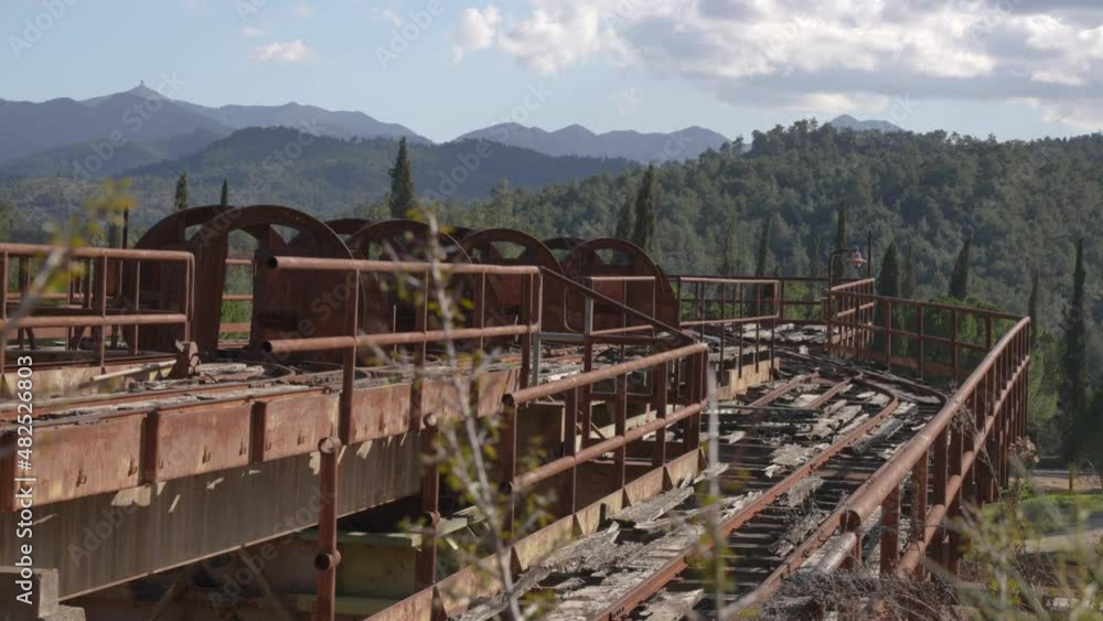 View of the top terrace of the deserted Mitsero mines with a beautiful forest mountain range in the background. View of the top terrace of the deserted Mitsero mines with a beautiful forest mountain range in the background.