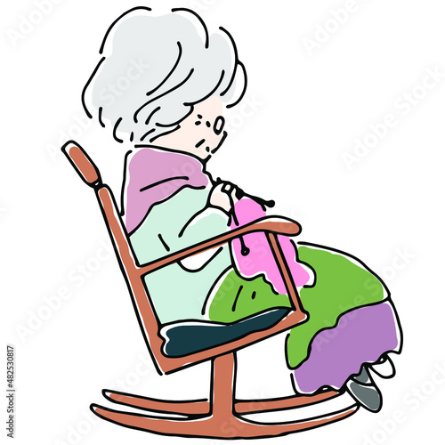 ロッキングチェアに座って編み物をするおばあさん