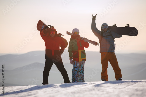 Group happy friends having fun at Sheregesh ski resort.