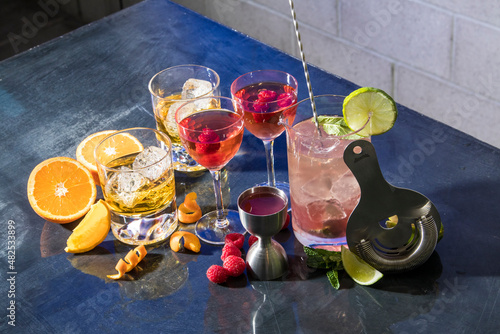 Canvas Print A set of cocktails and mixed drinks with car kit tools on the bar top