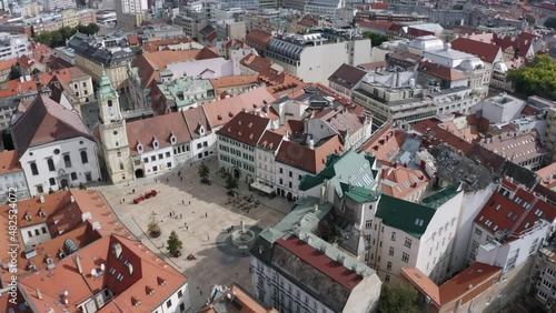Aerial flyover Bratislava Main square in old town, Slovakia, sunny summer photo