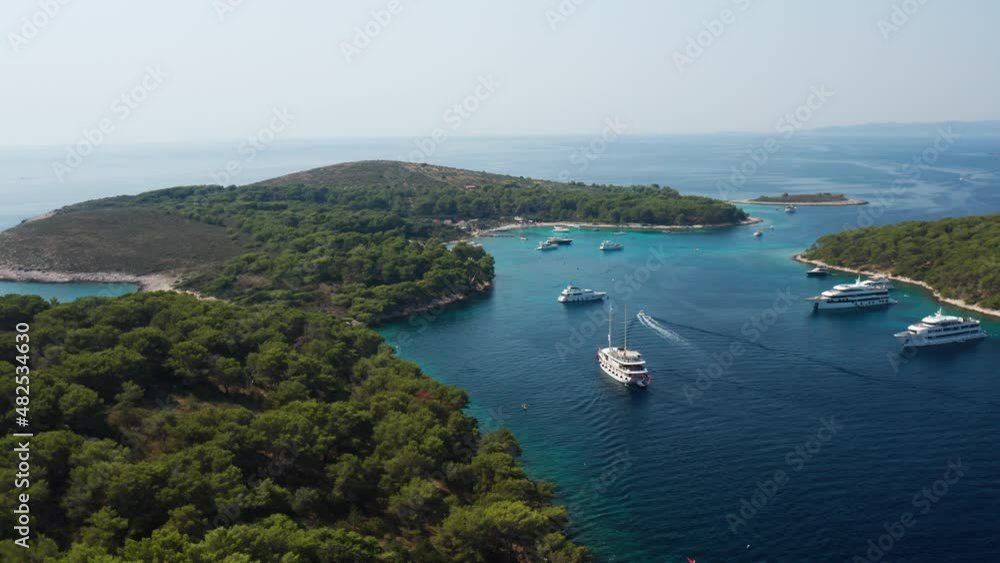 Luxury Ferry Boats Cruising In Adriatic Sea Near Paklinski Islands, Hvar Croatia. Aerial Wide Luxury Ferry Boats Cruising In Adriatic Sea Near Paklinski Islands, Hvar Croatia. Aerial Wide