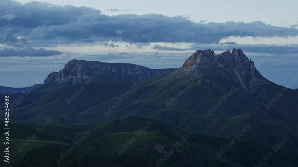 Landscape with Mother-in-law teeth mountain or Naujiza with fantastic cliffs in dusk, Caucasus, Russia, timelapse 4k Landscape with Mother-in-law teeth mountain or Naujiza with fantastic cliffs in dusk, Caucasus, Russia, timelapse 4k
