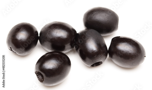 Black olives isolated on a white background.