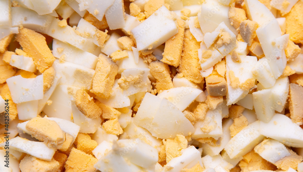 Sliced boiled eggs as a background. Sliced boiled eggs as a background.