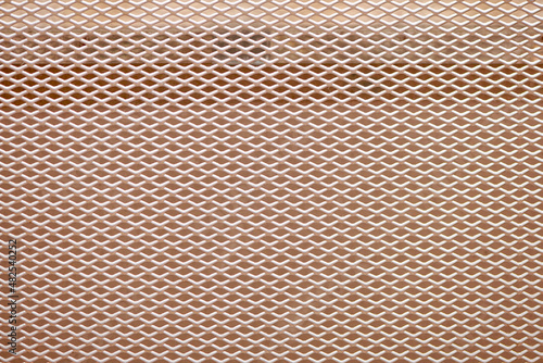 Metal mesh background with small cell. Mesh with rhomb cell. Decorative metal mesh