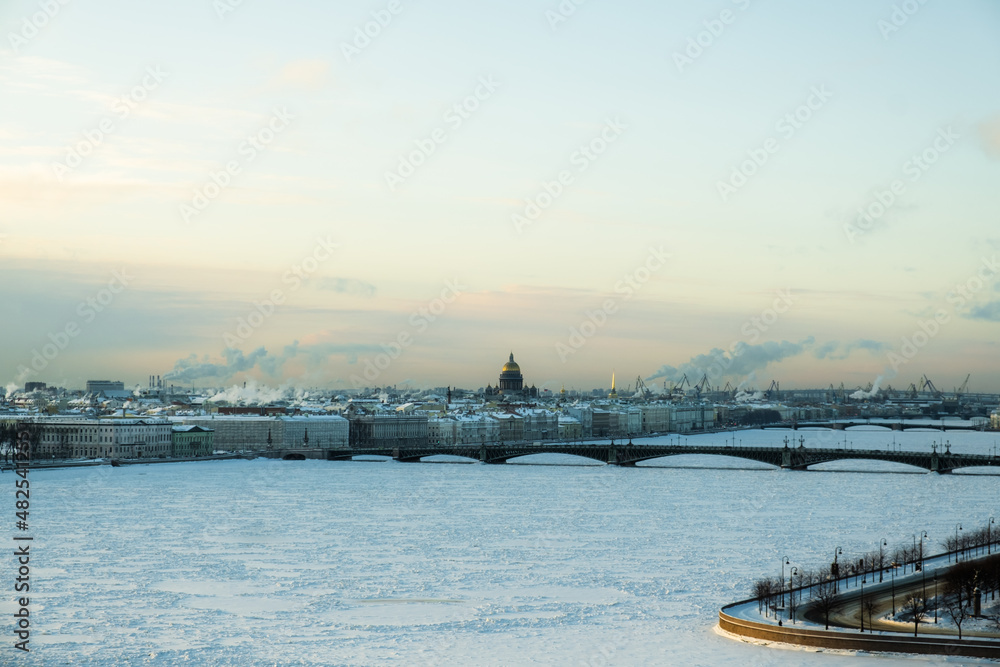 St. Petersburg, Russia - December, 2021: View of frozen Neva River and city center in early morning.