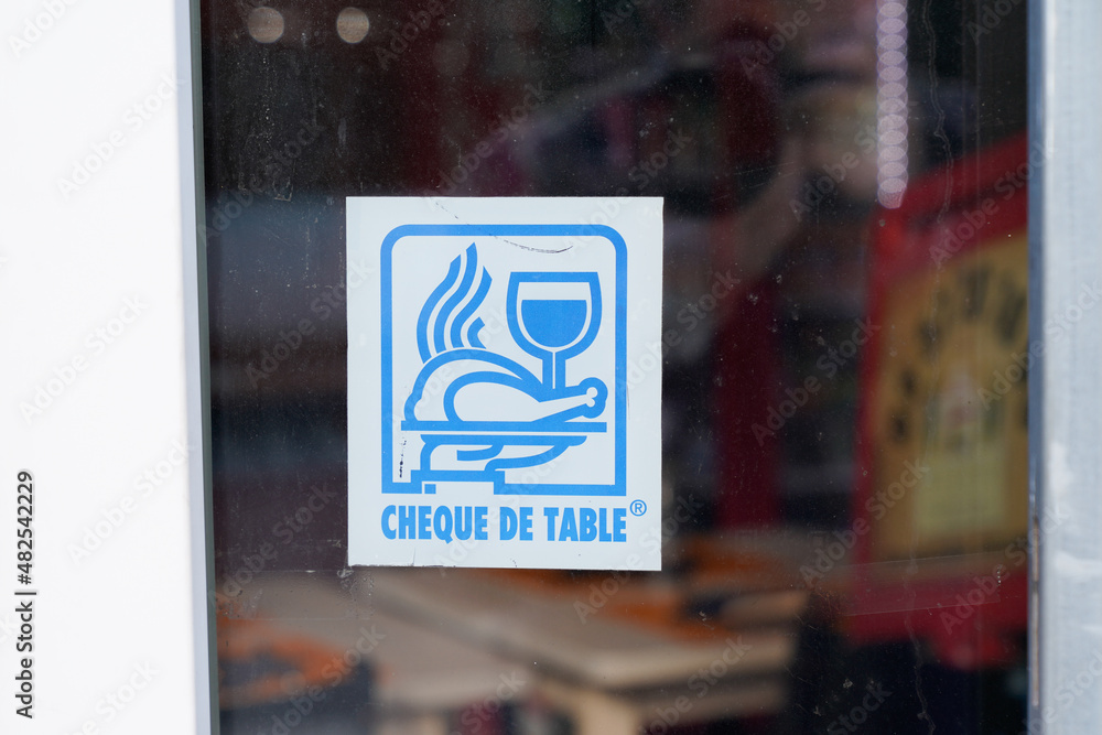 cheque de table logo brand yellow and text sign on windows restaurant door  entrance Photos | Adobe Stock