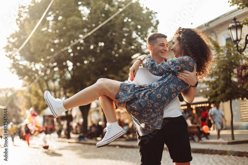 Young couple in love having fun together in the city. Romantic relationship concept