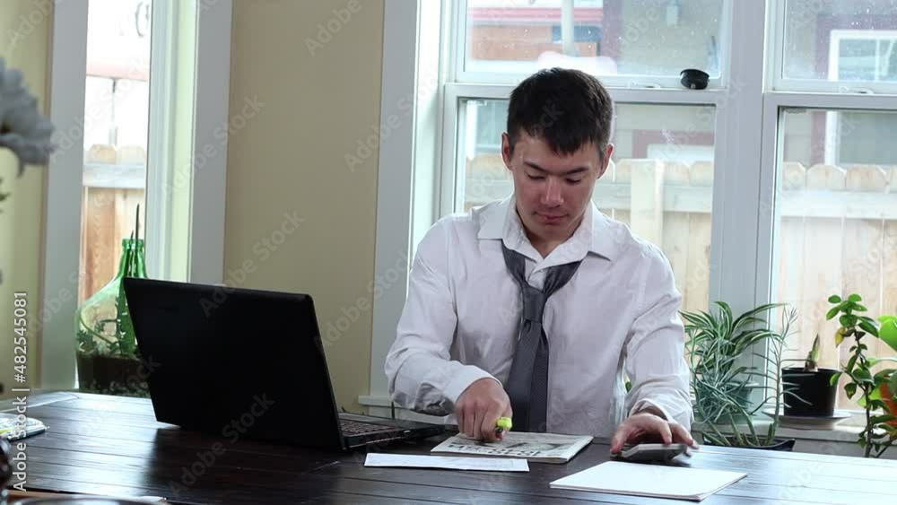 Double checking the numbers during a tax workbook session. Double checking the numbers during a tax workbook session.