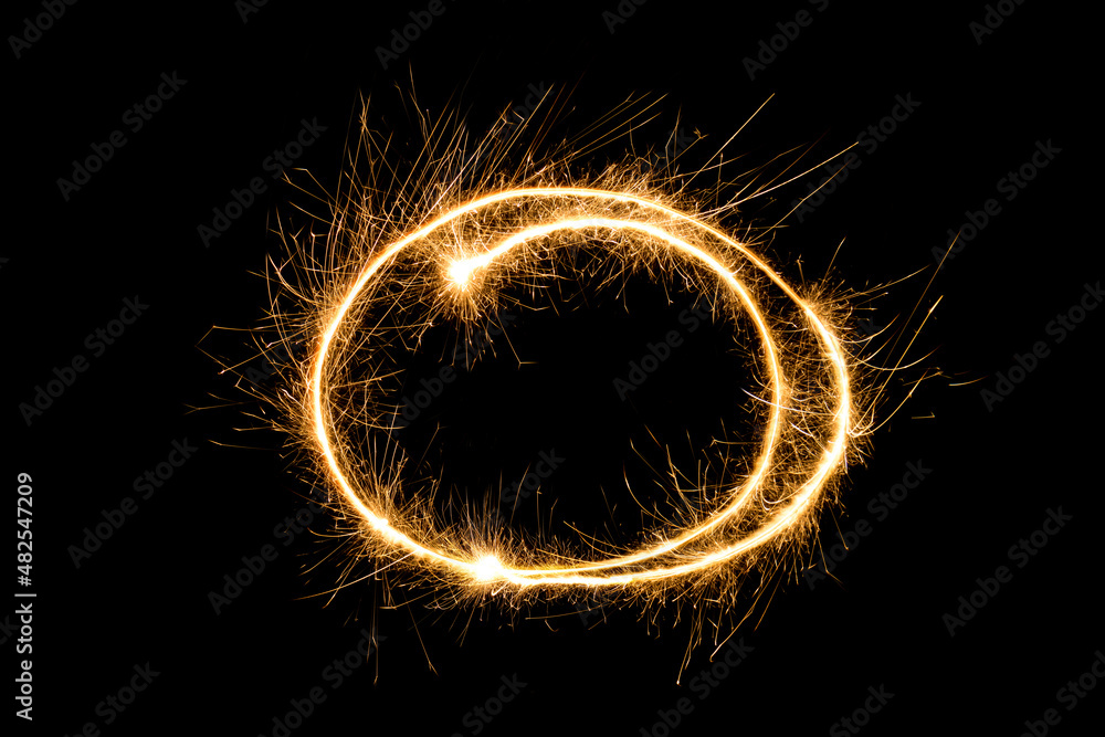 Sparkling round frame isolated on black background
