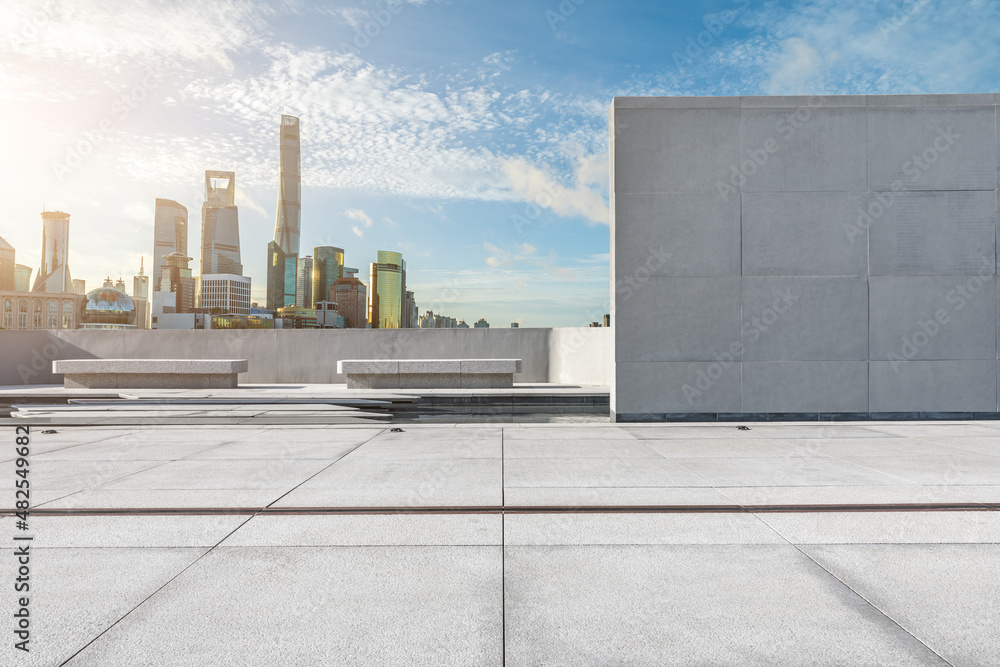 Panoramic skyline and modern commercial buildings with empty square floor in Shanghai, China. Panoramic skyline and modern commercial buildings with empty square floor in Shanghai, China.