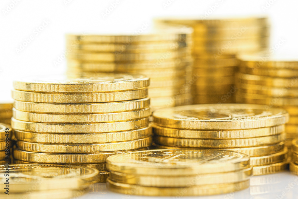 Coins stacked on white background Coins stacked on white background