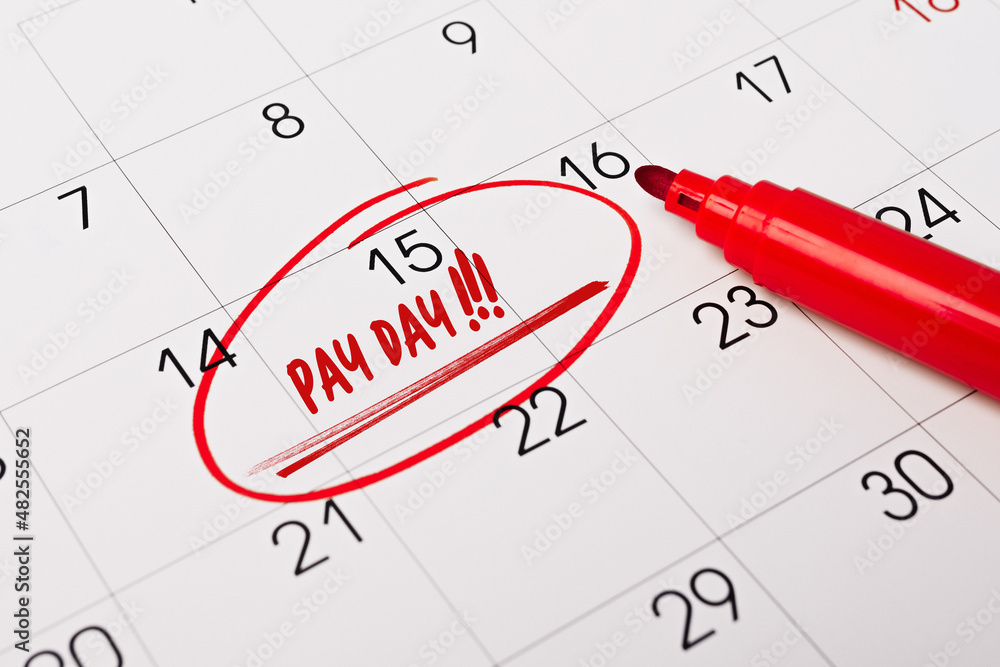 text - Pay day ritten on calendar for remind. Closeup of a personal agenda. Business, finance, savings money, wages, payroll or accounting concept text - Pay day ritten on calendar for remind. Closeup of a personal agenda. Business, finance, savings money, wages, payroll or accounting concept
