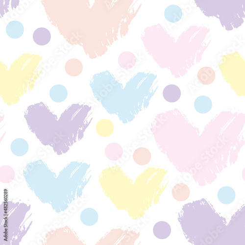 Abstract grunge heart shape silhouette with dots seamless pattern