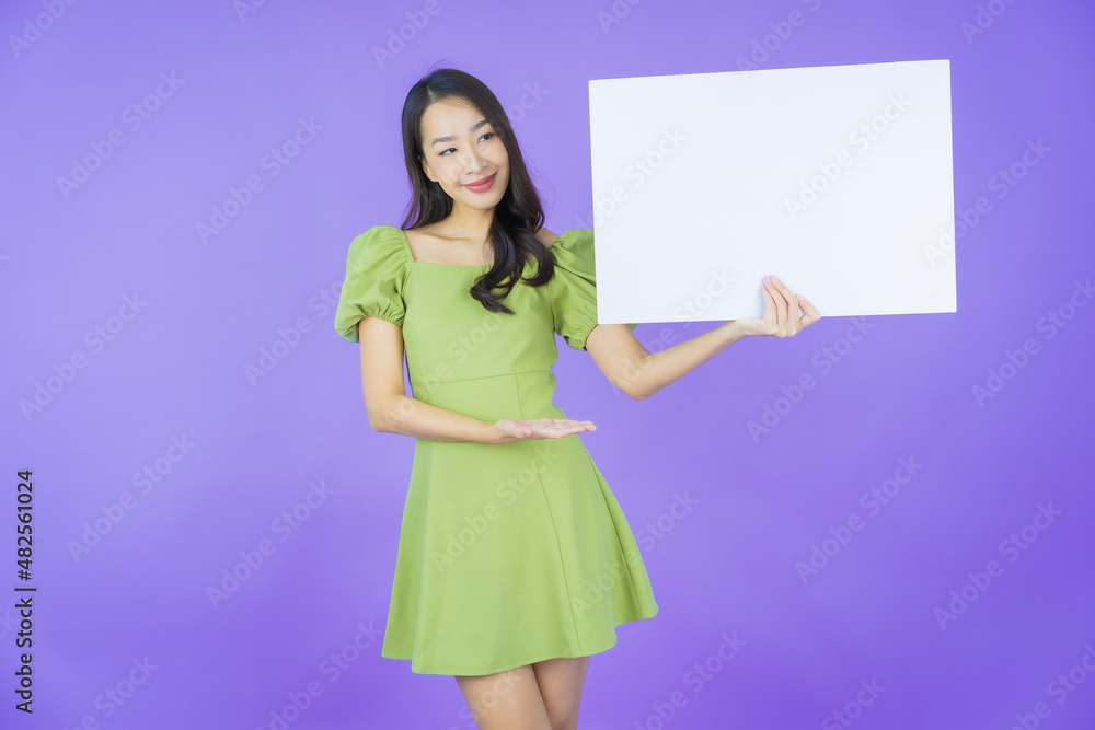 Portrait beautiful young asian woman with empty white billboard Portrait beautiful young asian woman with empty white billboard