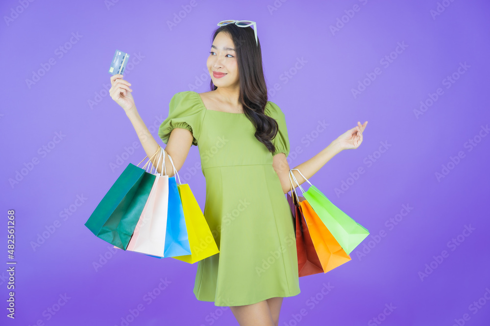 Portrait beautiful young asian woman smile with shopping bag Portrait beautiful young asian woman smile with shopping bag