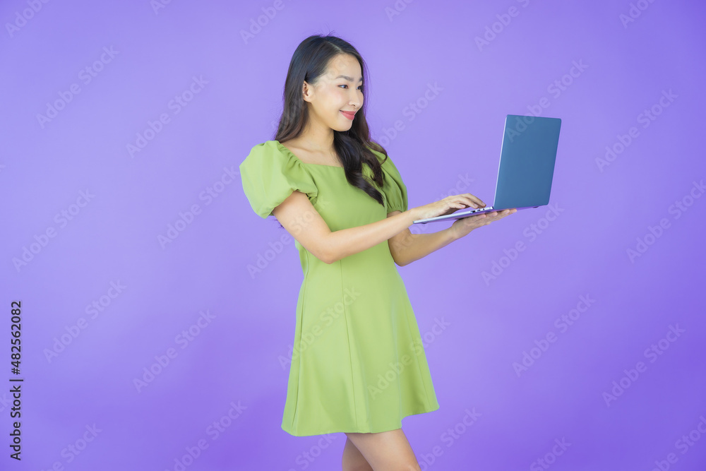 Portrait beautiful young asian woman smile with computer laptop Portrait beautiful young asian woman smile with computer laptop