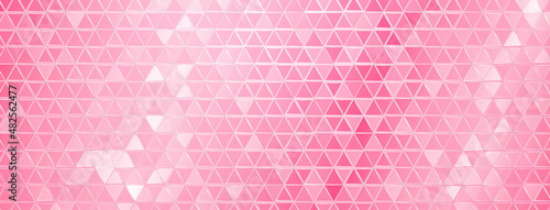 Abstract mosaic background of shiny mirrored triangle tiles in pink colors