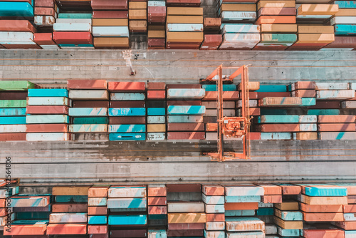 Aerial view of shipping container port terminal. Colourful pattern of containers in harbor. Maritime logistics global inport export trade transportation. photo