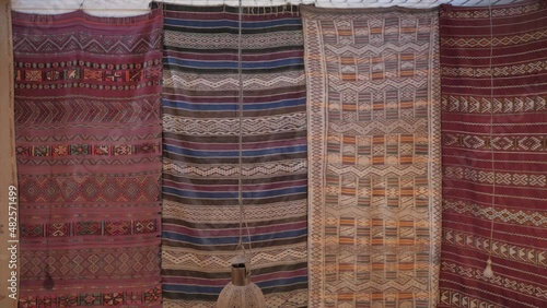 Colorful rugs and carpets. Traditional arabian  marrakech carpet market, shop with carpets and textile marketplace.