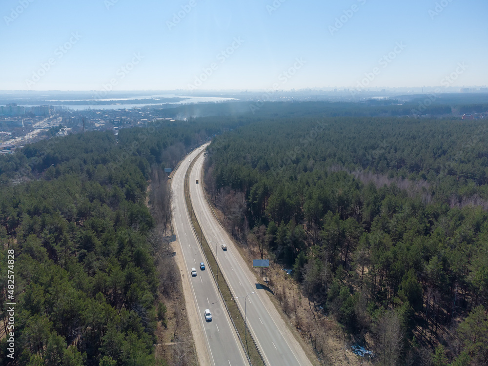 Section of highway with forest on both sides, aerial view Section of highway with forest on both sides, aerial view