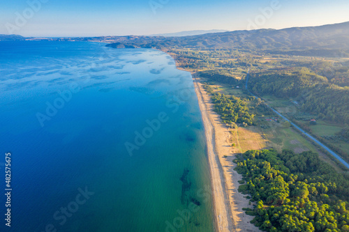 Aerial panorama of summer seascape of Mediterranean sea. Green hills of Peloponnese peninsula, Greece, Europe. © Tortuga