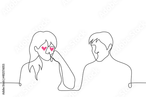 heterosexual woman in love admiring man sitting next to her, hearts in her eyes - one line drawing vector. concept of love and passion of woman for man