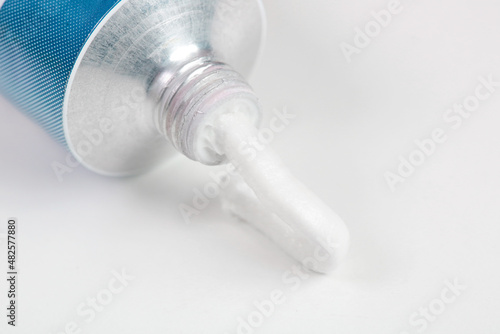 Close up image of ointment tube with squezzed product