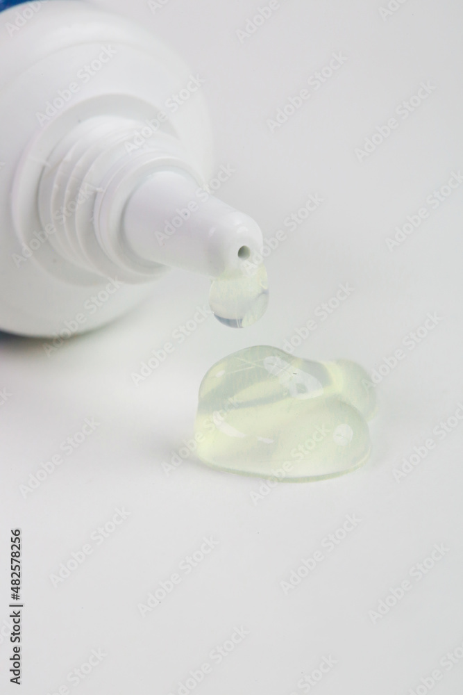 Close up image of cosmetic tube with squezzed gel Close up image of cosmetic tube with squezzed gel