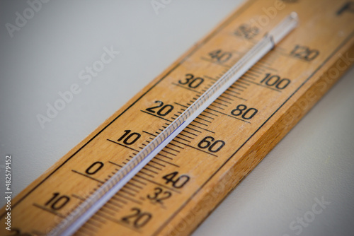 Vintage indoor thermometer on a white background