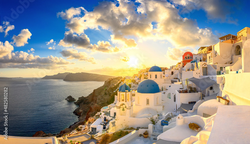 Picturesque sunset on famous view resort over Oia town on Santorini island, Greece, Europe. luxury travel. famous travel landscape. Summer holidays. Travel concept background.