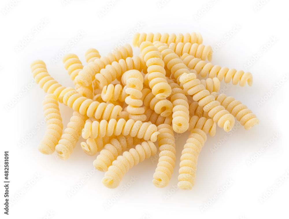Uncooked fusilli corti bucati pasta isolated on white background Uncooked fusilli corti bucati pasta isolated on white background