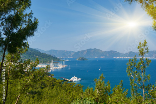 Fototapeta Naklejka Na Ścianę i Meble -  White yachts in the beautiful blue sea, travel, recreation and vacation concept.