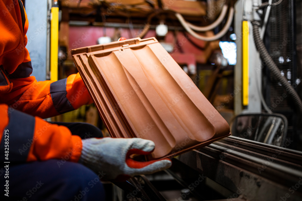 Production of roof tiles or shingle for construction industry. Factory