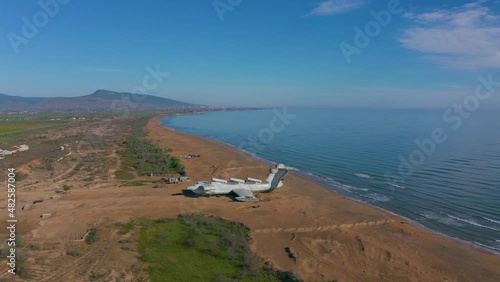 Soviet military aircraft-ekranoplan Lun on the coast of the Caspian Sea. Aerial photography. Dagestan, Derbent. photo