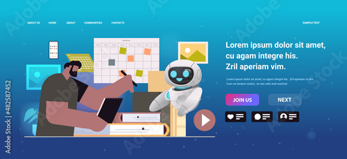 businessman with robot helper planning day scheduling appointment in calendar agenda meeting plan time management