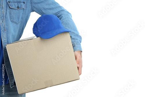 Delivery man holds box with hat, isolated on white background
