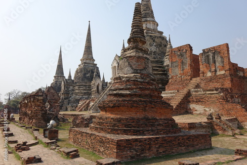 Adventure of exploring the ruins of red brick Wat Phra Si Sanphet temple  horizontal image   Ayutthaya  Thailand