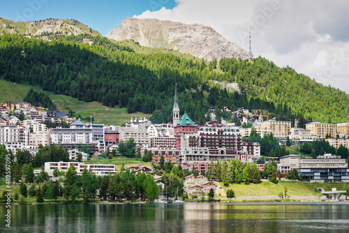 St. Moritz, high alpine resort town in the Engadine, Switzerland. Panorama townscape of Sankt Moritz with Lake St. Moritz in the Swiss canton of Graubünden, the Grisons. photo