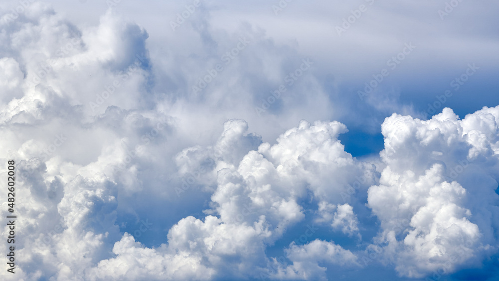 White porous clouds on the blue sky, cloudy landscape. White porous clouds on the blue sky, cloudy landscape.