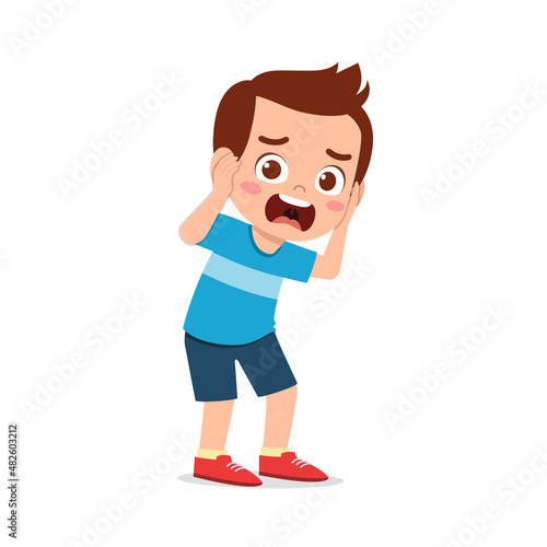 cute little boy cover ear from loud sound