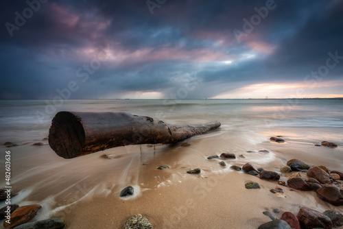 Fototapeta Naklejka Na Ścianę i Meble -  A beautiful sunrise on the Baltic Sea beach in Gdynia Orłowo. Poland